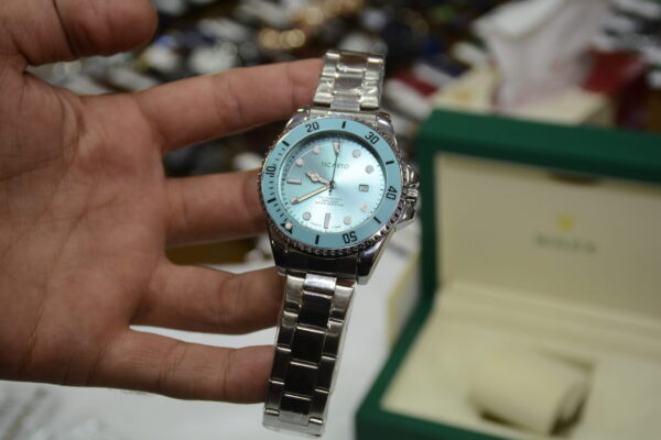 Silver circle body with Blue Dial
