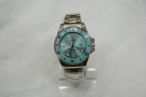 Silver circle body with Blue Dial