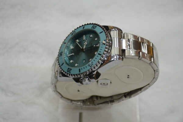 Silver circle body with Blue Dial