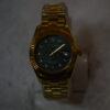 Golden body sea green dial Circular Design
