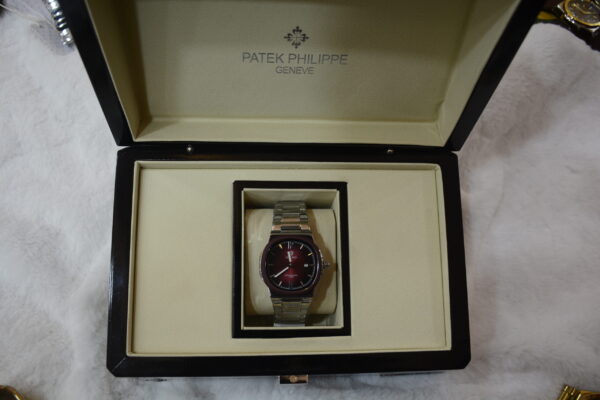 Silver body red dial circular boxy design