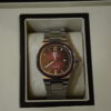 Silver body red dial circular boxy design