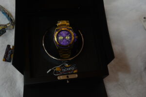 Golden body Purple Dial Circular design