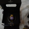 Golden body Purple Dial Circular design