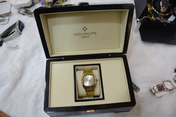 golden square body silver dial