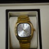 golden square body silver dial