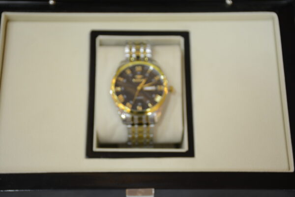 silver gold body black dial