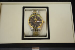 silver gold body black dial