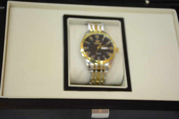 silver gold body black dial