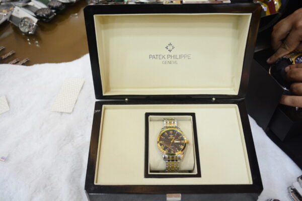 silver gold body black dial