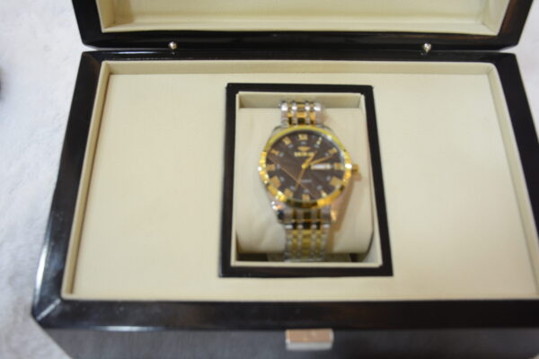 silver gold body black dial