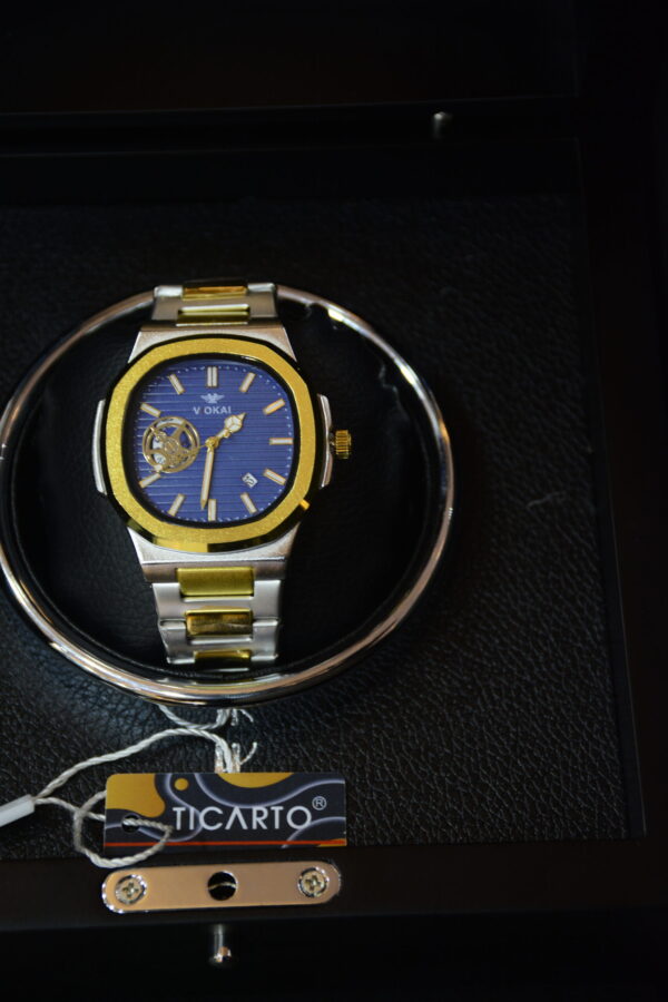 silver golden body dark blue dial