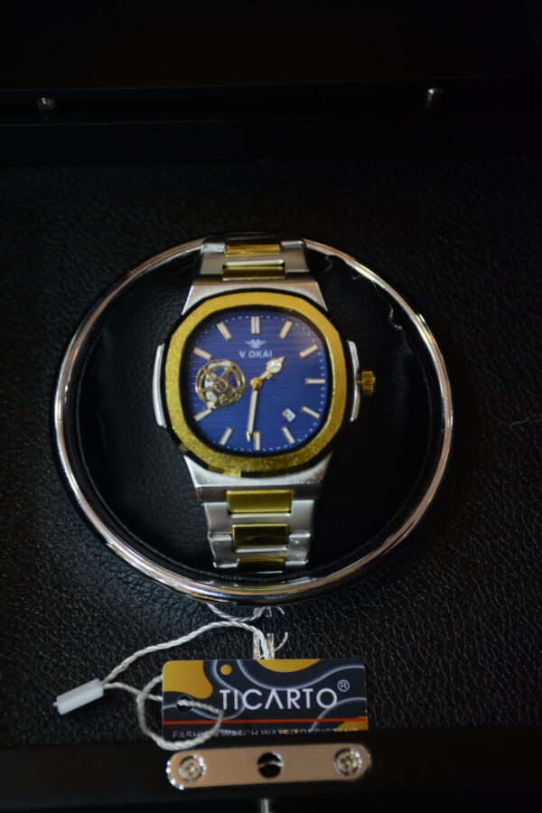 silver golden body dark blue dial
