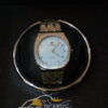 golden body light blue dial