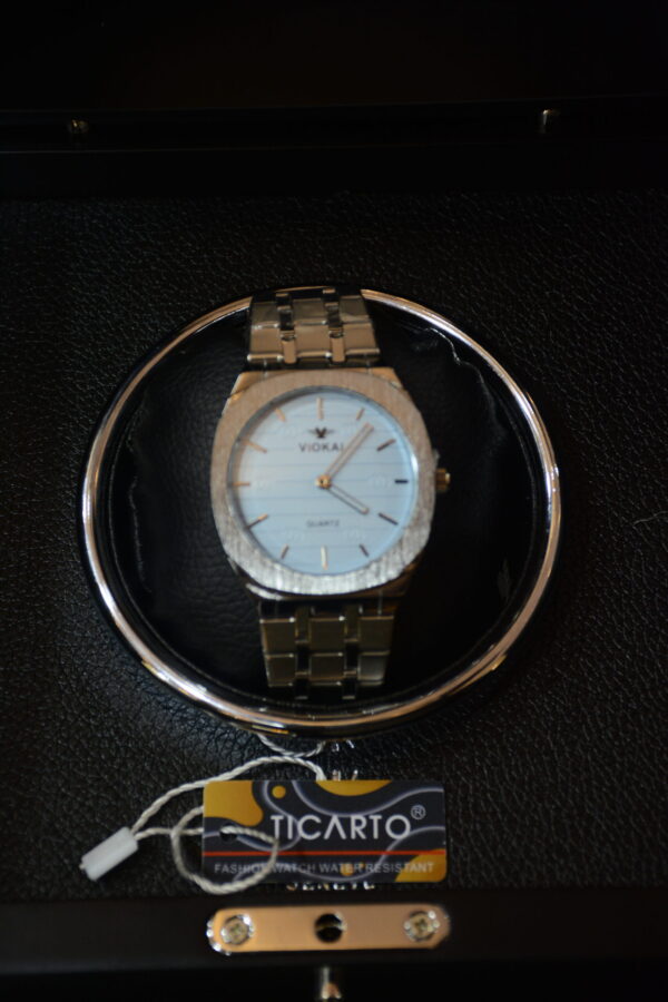 golden body light blue dial