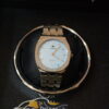 golden body light blue dial