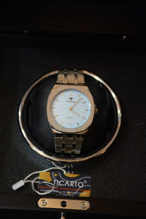 golden body light blue dial